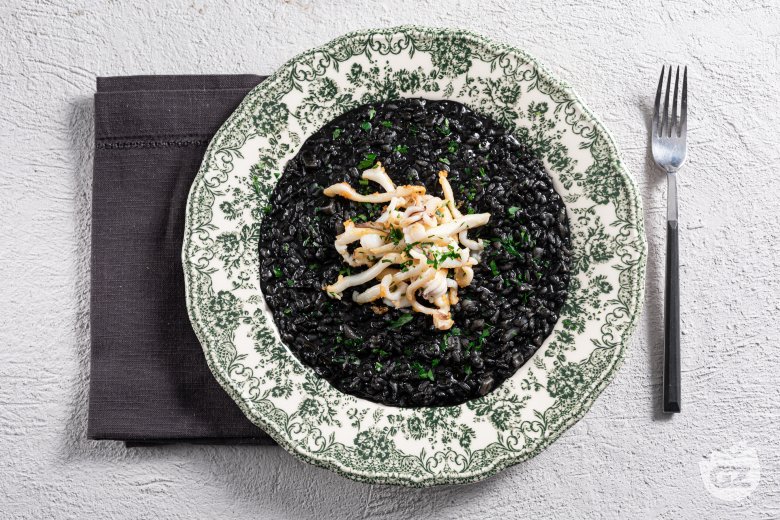 Squid ink risotto with sautéed cuttlefish