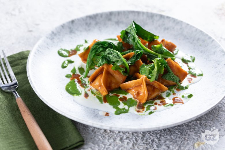 Shrimp ravioli with stracciatella and turnip greens