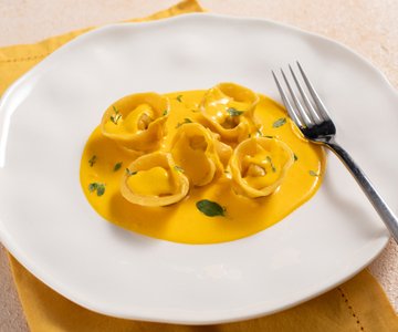 Fish ravioli with saffron sauce