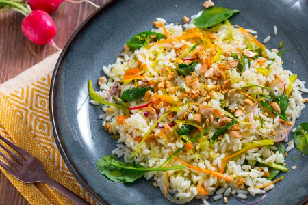 Rice salad with vegetables and peanuts