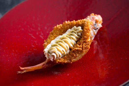 Fried red mullets with anchovy butter