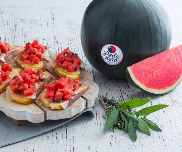 Crostino with marinated watermelon and cheese