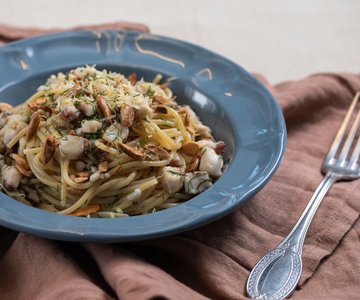 Spaghetti with mullet, almonds, and fennel