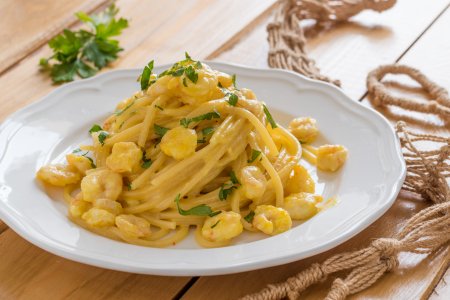 Spaghetti with shrimp, stracchino, and saffron