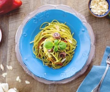 Spaghetti with pesto, anchovies, and peppers