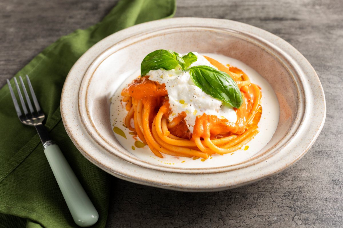 Pasta with cherry tomato sauce and stracciatella