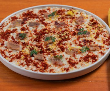 Risotto with butter, anchovies, and crunchy peppers