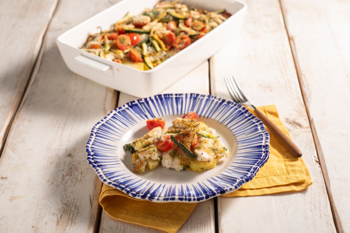 Gratinated Sea Bass with Tomatoes, Potatoes, and Zucchini