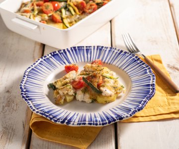 Gratinated Sea Bass with Tomatoes, Potatoes, and Zucchini