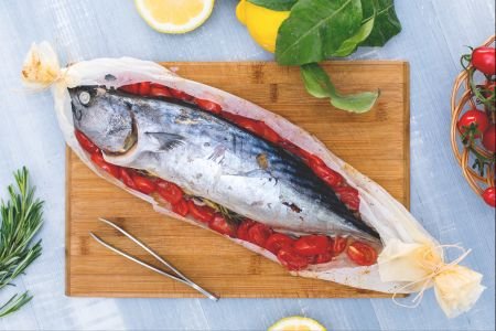 Bonito en papillote with cherry tomatoes