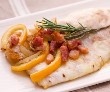 Sea bass (branzino) with bacon, onions, and sweet and sour oranges