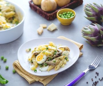 Pasta bake with artichokes, potatoes, and peas