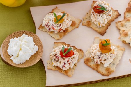 Olive puffs with ricotta and grilled peppers