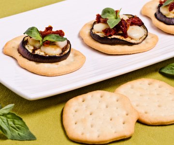 Flatbreads with eggplant, scamorza cheese, and sun-dried tomatoes