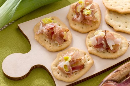 Spianatine with julienne of leek and speck