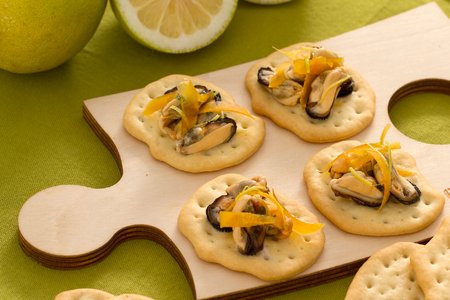 Flatbreads with mussels, bottarga, and lemon zest