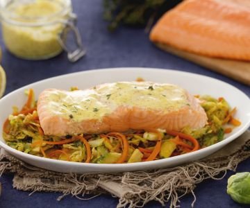 Salmon fillets on julienne of Brussels sprouts, leeks, and carrots