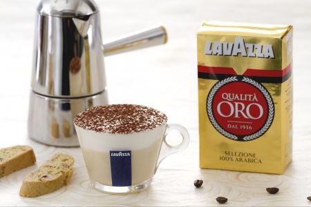 Coffee mousse in cup with cantucci