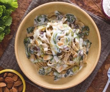 Whole wheat tagliatelle with escarole and taleggio fondue