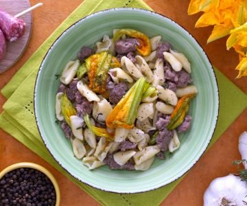 Cavatelli with sausage and zucchini flowers