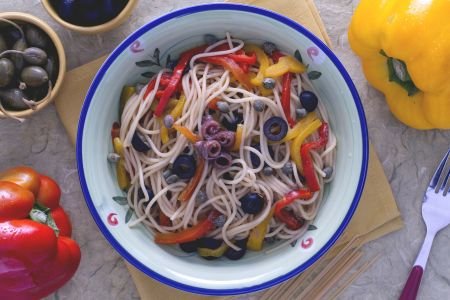 Spaghetti with peppers, olives, and capers