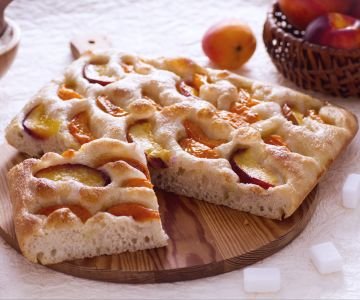 Sweet focaccia with peaches and apricots