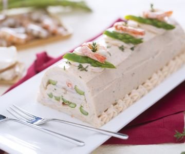 Savory log with salmon mousse, asparagus, and prawns
