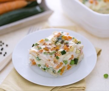 Lasagna with sliced bread, cheese, and vegetable ragù