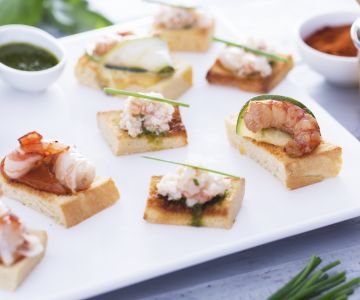 Trio of brioche bread canapés with shrimp
