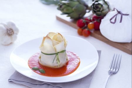 Pouches with burrata, artichokes, and tomato sauce