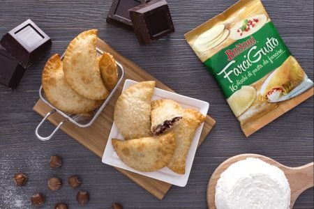 Panzerotti with ricotta, chocolate, and hazelnut grains