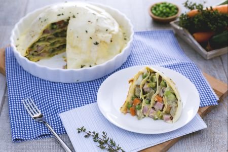 Lasagna dome with vegetables, fontina, and ham