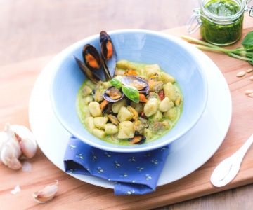 Potato gnocchi with pesto, mussels, and clams