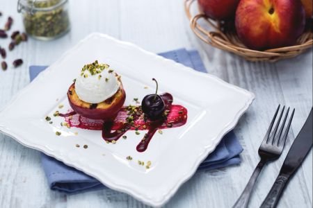 Robiola-stuffed peaches with spicy cherry sauce