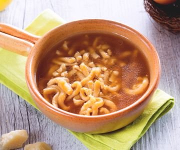 Passatelli in broth with soy sauce