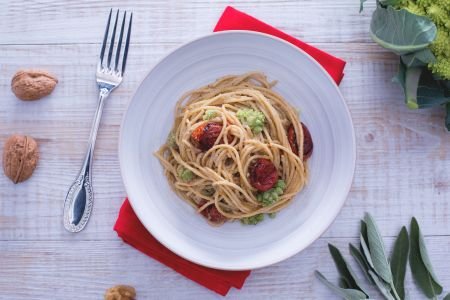 Spaghetti with sage and walnut pesto