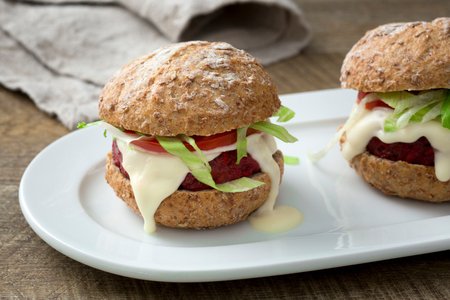 Rice and beetroot burgers with Grana Padano sauce