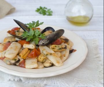 Rice gnocchi with mussels and cherry tomatoes