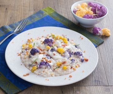 Risotto with colorful cauliflowers, stracciatella, and guanciale