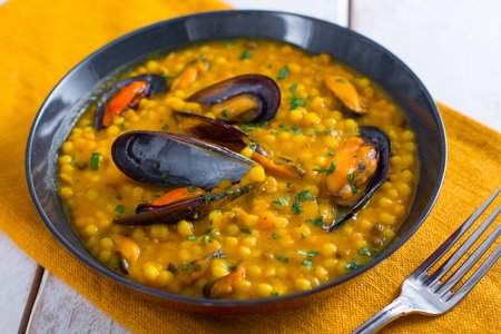 Fregola with pumpkin and mussels