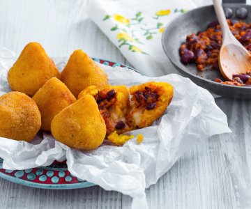 Arancini with bean ragù
