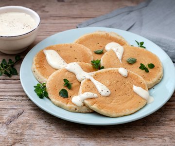 Savory pancakes with Grana Padano PDO sauce
