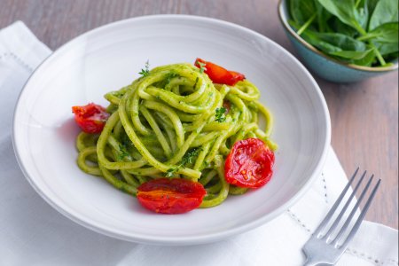 Troccoli with baby spinach pesto and cherry tomatoes
