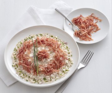 Beer risotto with culatello and robiola