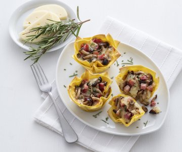 Lasagna cupcakes with pioppini mushrooms