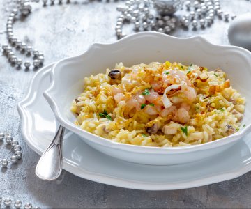 Orange risotto with swordfish and shrimp