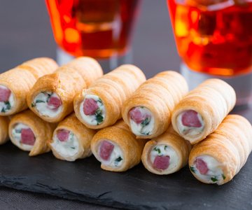 Savory puff pastry rolls with goat cheese and bacon