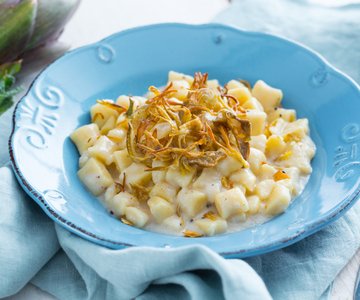 Gnocchi with cacio e pepe and crispy artichokes