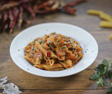Penne arrabbiata with champignon mushrooms