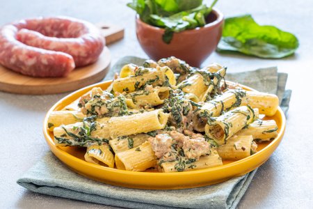 Rigatoni with spinach, sausage, and robiola